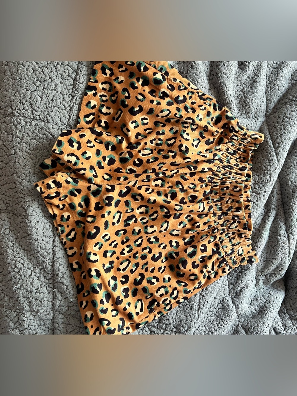 Leopard print with teal accent stretch high waist shorts with pockets